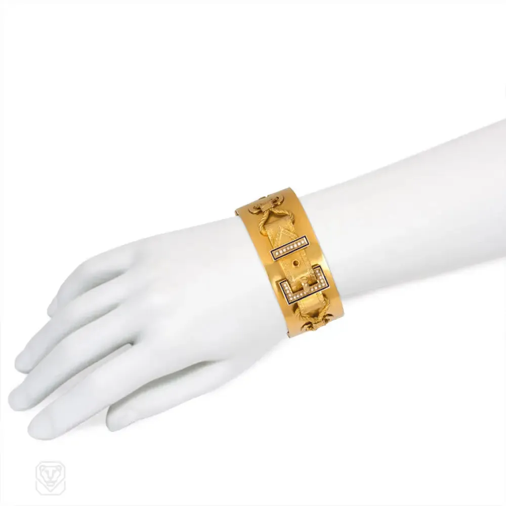 Antique gold, enamel, and pearl buckle bangle