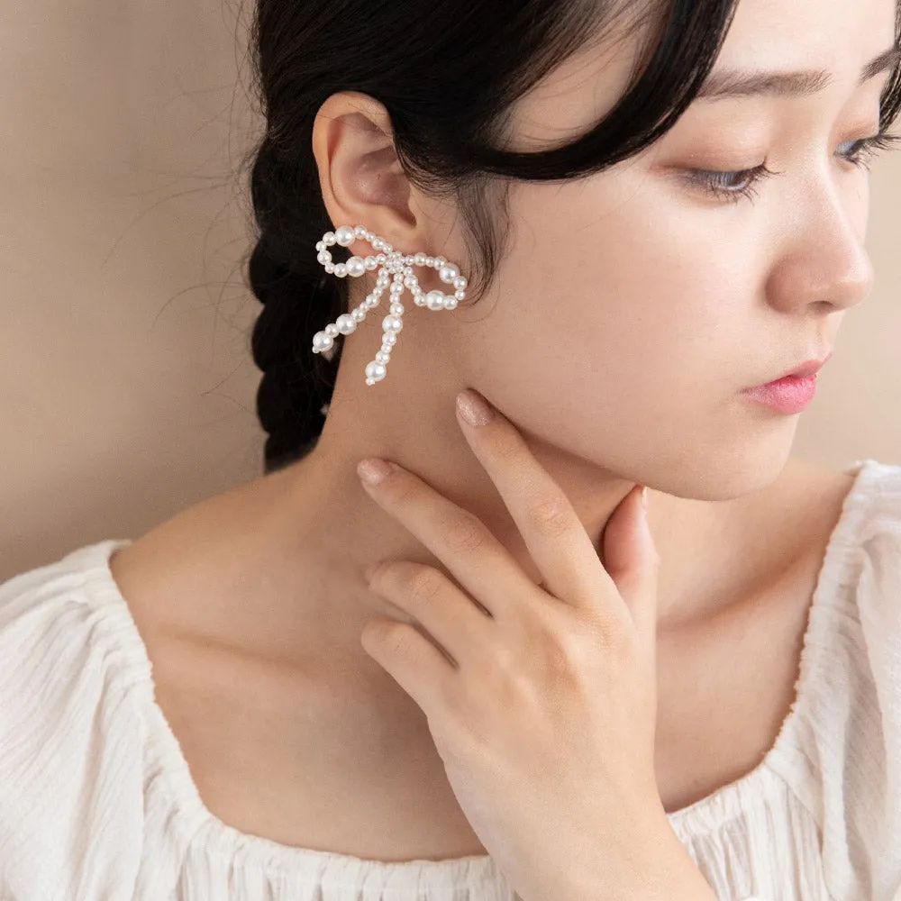 Bubble Pearl Bow Clip On Earrings
