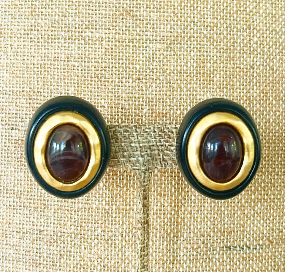 Classic oval clip on designer style vintage earrings.
