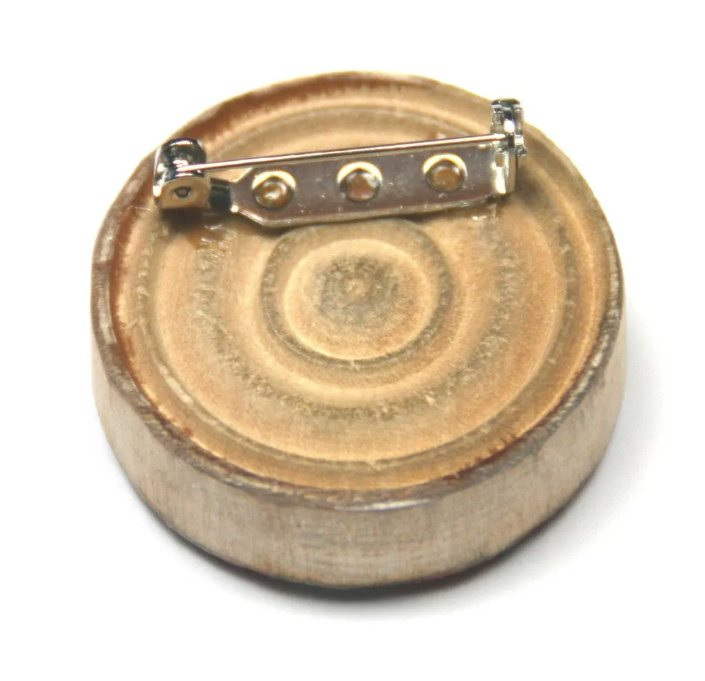 Elegant Gold Brooch Inspired by Draughts Game Piece Design