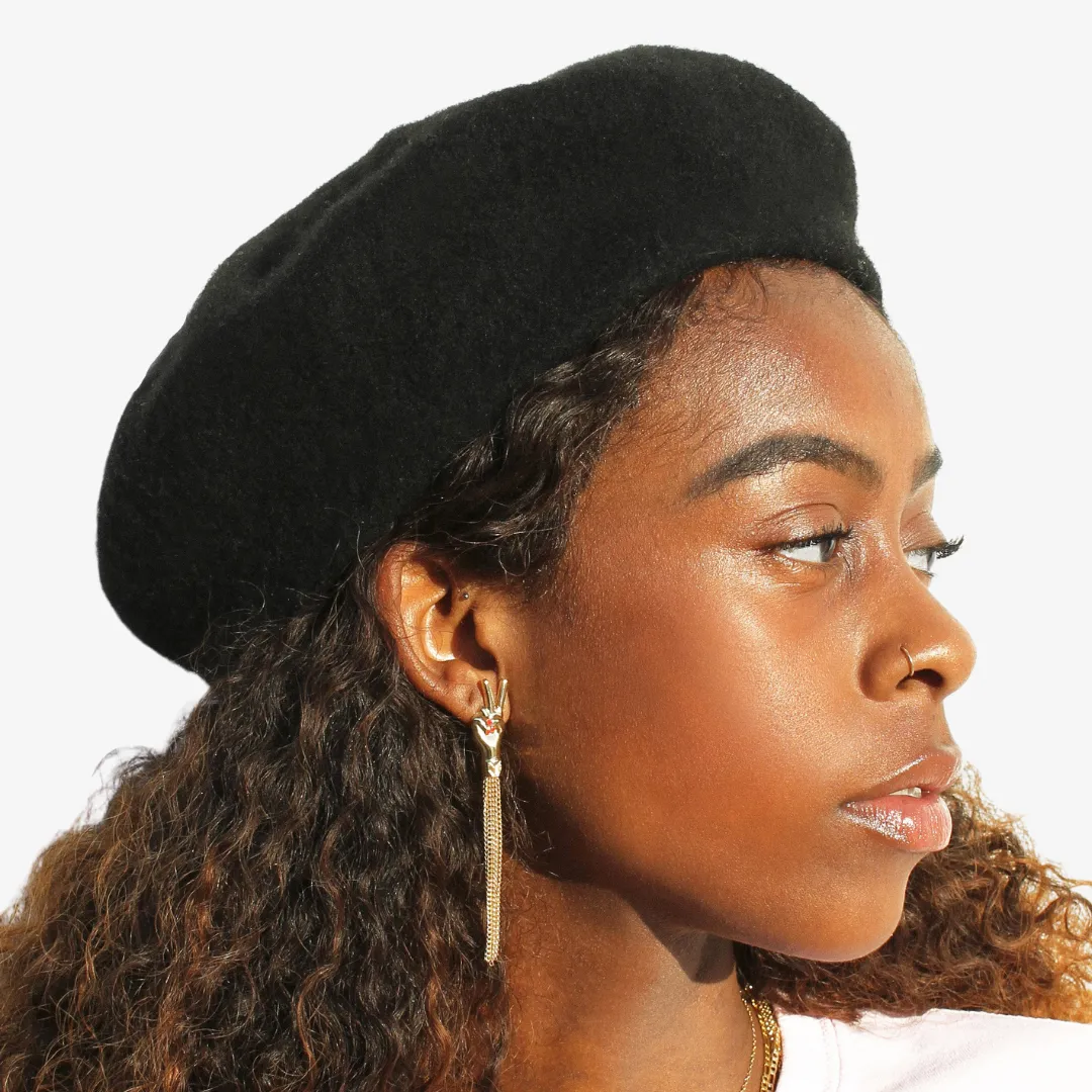 melody ehsani peace tassel earrings (gold)